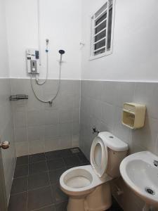 Ένα μπάνιο στο SWee Garden Homestay +9 φωτογραφίες