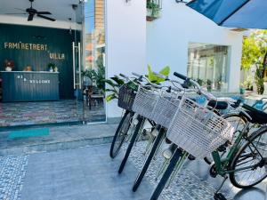 two bikes parked in front of a store at Fami Retreat Villa Hoi An in An Bang