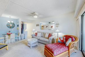 a living room with a couch and a table at Bluewater East 407 S in Ocean City