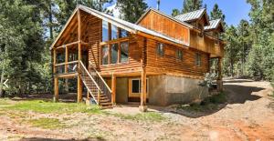 a house being constructed in the woods at Cozy three bedroom cabin in Duck Creek in Duck Creek Village