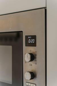 a close up of a machine with a clock on it at casa kwispel genieten met uw hond in de natuur in Haarle