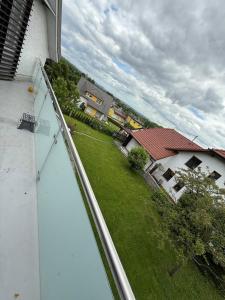 an aerial view of a yard with houses and a building at Gemütliche Unterkunft 10 min von Linz entfernt 