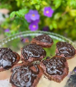 a plate of food with chocolate cookies on it at Principal Jeri in Jericoacoara