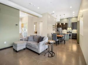 a living room with a couch and a table at Modern Mountain Retreat Single Level Living in Glenwood Springs