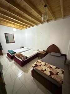 Postel nebo postele na pokoji v ubytování Badya Camp بادية كامب