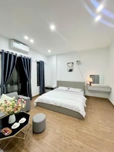 Katil atau katil-katil dalam bilik di TN Homestay Tâm Anh