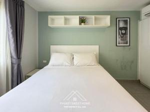 Ένα ή περισσότερα κρεβάτια σε δωμάτιο στο Condo for rent CHALONG RAWAI PHUKET +1 φωτογραφίες