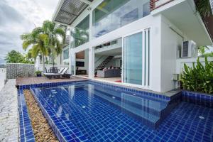 an image of a swimming pool in a villa at Raya Villa, 2 Bed Beachfront Villa Private Pool in Ban Saiyuan (1)