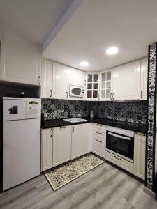 Køkken eller tekøkken på Somport bienvenidos a Canfranc Family