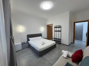 Ένα ή περισσότερα κρεβάτια σε δωμάτιο στο U Sweet Home