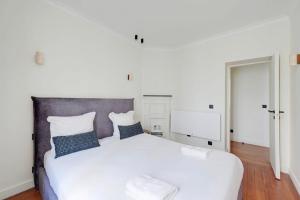 En eller flere senge i et værelse på Beautiful apartment L031 + 4 billeder