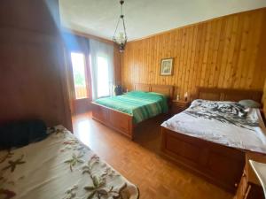 Ένα ή περισσότερα κρεβάτια σε δωμάτιο στο Casa PANASTRE