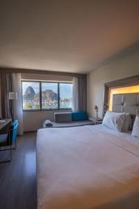 Postel nebo postele na pokoji v ubytování Novotel RJ Praia de Botafogo + 98 fotografií