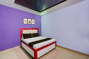 Ένα ή περισσότερα κρεβάτια σε δωμάτιο στο Hotel O Welcome House & Restaurant