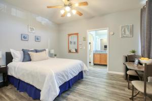a bedroom with a bed and a dining room at Pacific Plaza #603 - Salty Studio - StudioD-Q in Oceano +31 photos