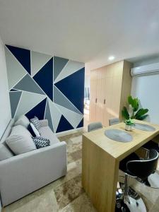 Χώρος καθιστικού στο Estudio moderno con alberca - Centro