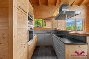 Kuchyň nebo kuchyňský kout v ubytování Chalet les Crêtaux
