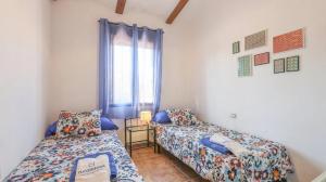 Postel nebo postele na pokoji v ubytování Casa Rural y Espacio para Eventos El Pantano + 37 fotografií