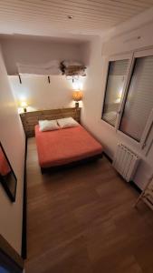 Ένα ή περισσότερα κρεβάτια σε δωμάτιο στο Maison L'Escapade 100 m DE LA PLAGE