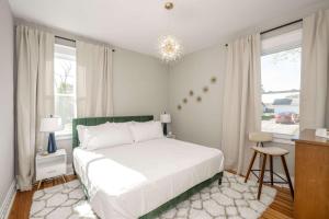 Ένα ή περισσότερα κρεβάτια σε δωμάτιο στο Bridgetown Bungalow
