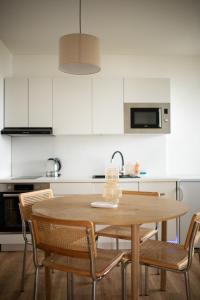 Kuchyň nebo kuchyňský kout v ubytování Útulný apartmán s výhledem na Lipno