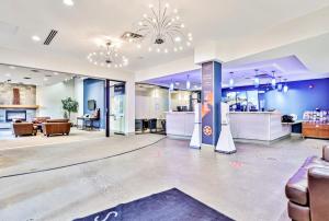 a lobby of a store with chairs and tables at Cozy 2BR Retreat Mountain View with Pool and Hot Tub in Canmore +35 photos