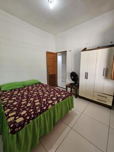 Giường trong phòng chung tại Casa Kuaracy - Praia do Coqueiro, Luis Correia