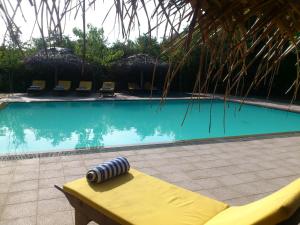 Bassein majutusasutuses Giman Free Beach Resort või selle lähedal