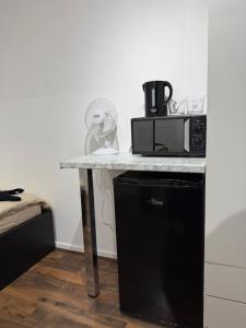 Nhà bếp/bếp nhỏ tại London Clapham Room - Local +14 ảnh