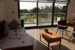 Postel nebo postele na pokoji v ubytování OMNA Villa + 22 fotografií