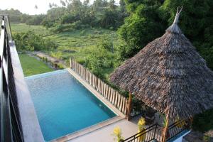 Bazén v ubytování OMNA Villa nebo v jeho okolí