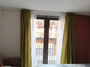 Ένα ή περισσότερα κρεβάτια σε δωμάτιο στο Departamento 4 Ote