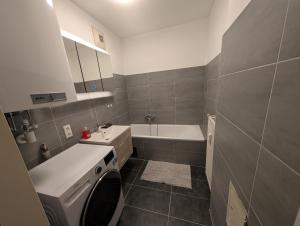 Koupelna v ubytování Flataid Apartment Obere Bahnstraße - Grazer Messe