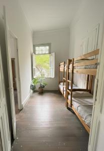 Ένα ή περισσότερα κρεβάτια σε δωμάτιο στο Hostel Samba