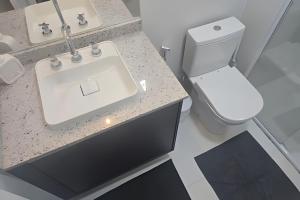 Ένα μπάνιο στο Apartamento ao lado do EZTower - com 1 vaga!