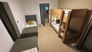 Ένα ή περισσότερα κρεβάτια σε δωμάτιο στο Lou Garden Suite