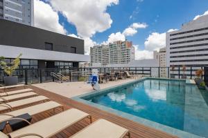 Πισίνα στο ή κοντά στο Studio Premium em Prédio com Piscina - BAT1814