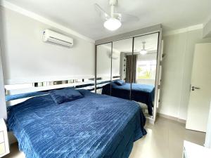 Postel nebo postele na pokoji v ubytování Apartamento 3 quartos em Bombas + 13 fotografií