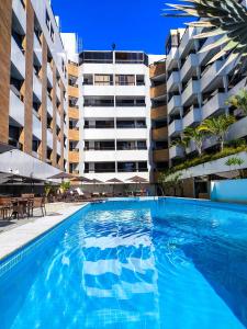 Bazén v ubytování Gold Flat com Café by Apartamentos Jampa nebo v jeho okolí