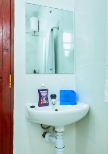 Koupelna v ubytování RICI HOMES Da-Azizi apartment