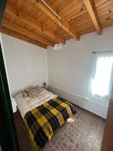 Postel nebo postele na pokoji v ubytování La Casita, casa de campo