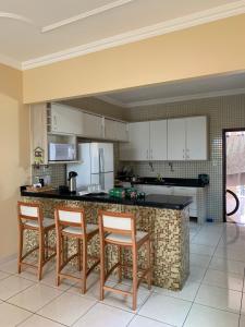 Kuchyň nebo kuchyňský kout v ubytování Casa COP30