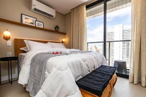 Ένα ή περισσότερα κρεβάτια σε δωμάτιο στο Studio Premium p/ 4 pessoas no All Batel - BAT1816