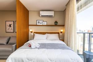 Ένα ή περισσότερα κρεβάτια σε δωμάτιο στο Studio Premium p/ 4 pessoas no All Batel - BAT1816