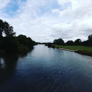 a view of a river from a bridge at Ferryboat Inn in Pangbourne