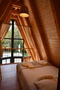 Postel nebo postele na pokoji v ubytování Tasija Relax & Spa + 27 fotografií