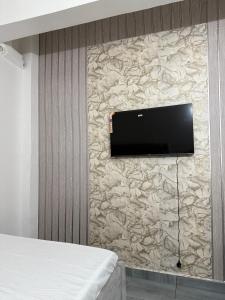 TV a/nebo společenská místnost v ubytování Kisimani Heights + 21 fotografií