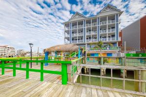 a boardwalk with a hotel and a building at Emerson Towers 504 in Ocean City