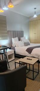 En eller flere senge i et værelse på Gabriaza