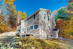 an older house with a gambrel at Moose Lodge Unit B in North Bethel